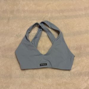 Small Light blue sports bra with padding inserts. Fits 30-34 band width